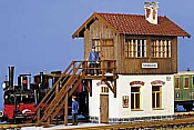 This Pola kit looks an awful lot like the control tower that the trains pass when leaving the big station. Click for bigger image.