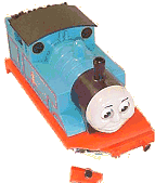 This Thomas is a little faded, but he runs well and I have glued him back together. I'll use him for a backup now that I have one that is in better condition. Click for a bigger image