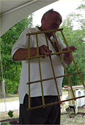 George shows a trestle bent he has made. Click for bigger photo.