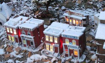 The Donnels Creek buildings, lit, after a light snowfall a few days after the Christmas train day.