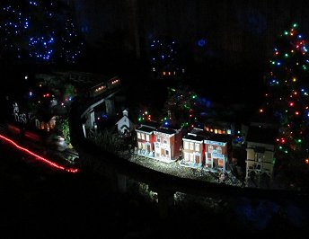 Long view of New Boston after dark, Christmas Train Day, 2013.  Click for a bigger photo.