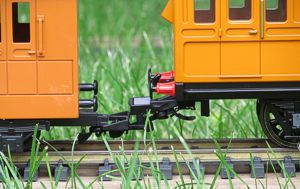 Bachmann's body-mounted couplers are higher than Lionel's truck-mounted couplers.  Click for bigger photo.