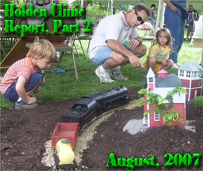 Garden Railroading Clinic Report. This photo is from a clinic at the Holden Arboretum in August, 2007. If this is your family, let us know and we'll send you a 5x7. Click to see a bigger photo.