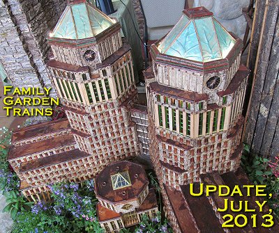 July, 2013 Update from Family Garden Trains<sup><small>TM</small></sup>.  This photo is from Applied Imagination's lobby display at the 2013 National Garden Railway Convention. I'm told it's a reproduction of the Proctor and Gamble towers, made entirely of natural materials, a la Paul Busse's techniques.  Click for a bigger photo. 