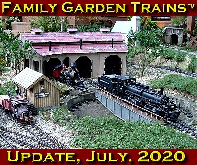 July, 2019 Update from Family Garden Trains<sup><small>TM</small></sup>.  Jim & Barb Kimmel's Railroad, Sept, 2005, known for elaborate scratchbuilt structures and carefully trimmed dwarf trees.  Click to see a bigger photo.
