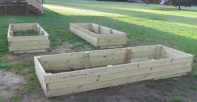The 'raised garden beds' ready for dirt.  Click for bigger photo.