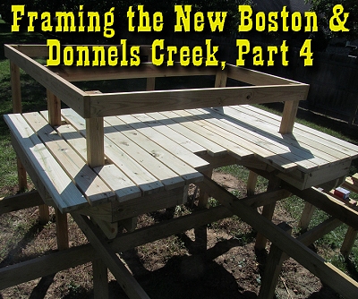 The decking for the top railroad layer of the New Boston and Donnels Creek Railroad is mostly in place. This photo was taken from a stepladder - the decking is about 5' above the ground. Click for bigger photo.