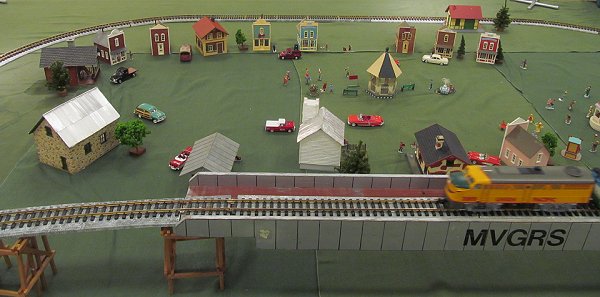 A larger village featuring several PIKO store fronts on the MVGRS display railroad at the Dayton Ohio Train Show, November, 2017.  Click for bigger photo.