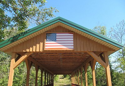 A covered bridge that my brother-in-law Roy Howard built for a client.  Click for a bigger photo.