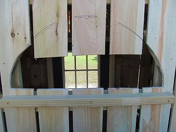 Cutting out the lower part of the frame and installing the windowsill.  Click for bigger photo.