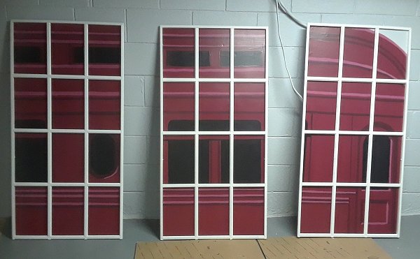 The three panels tacked into their frames and trimmed around the edges.  Click for bigger photo.