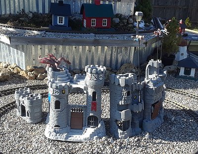We set up the castle display with Harry Potter, Ron and Hermione to complement the Lionel Hogwarts Express once again.  Click for bigger photo.