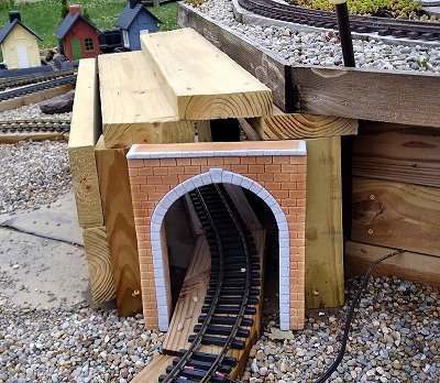 The I.S.L.E brick portal, #160, leaning against my tunnel frame to see if it's a good fit.  Click for bigger photo.