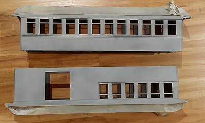 The Bachmann passenger cars once they've been masked and primed.  Click for bigger photo.