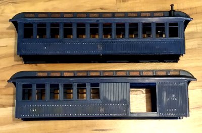 The Bachmann Royal Blue passenger cars with the lettering sanded off.  Click for bigger photo.