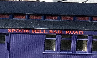 The Spook Hill Rail Road lettering on the combine's signboard.  Click for bigger photo.