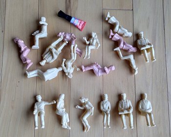 The unpainted seated figures as I received them.  Click for bigger photo.