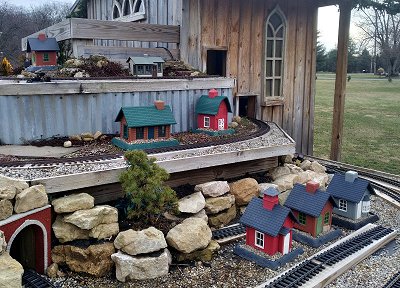 The 'winter buildings' on the west side of my railroad, winter of 2021-2022.  Click for bigger photo.