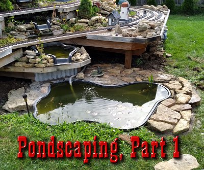 Adding rows of rocks around the pond to help cut down weeds and make things look a bit more finished. Click for bigger photo.