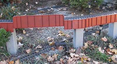 The bridge with the screws puttied and painted over. Click for bigger photo.