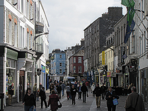 In Galway, 16th-century buildings welcome 20th-century shoppers and diners.  Click for bigger photo.