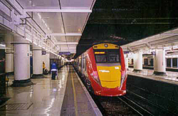 This is a typical Gatwick Express train.  The photo is from Kris Kuzera's student photo collection from Clark University.  Click to go to the student's site and see a bigger picture.