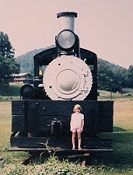 These photos must be from our second trip, in '83 or '84.  Our first child demonstrates that to a two-year-old ANY locomotive seems pretty big.