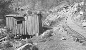 These 'mobile' homes were moved from one logging camp to another for worker housing. Click to see a slightly larger photo.