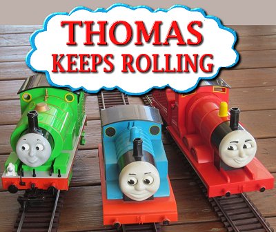 Thomas Keeps Rolling.  My Lionel Thomas and James, with the Bachmann Percy added. Click for a bigger photo.