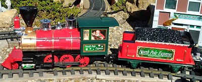EZ-Tech's ubiquitous red Mogul.  This version - with the covered windows - has the batteries in the cab.  Earlier versions have the betteries in the tender - you can tell by the cab being open.  Click for bigger photo.