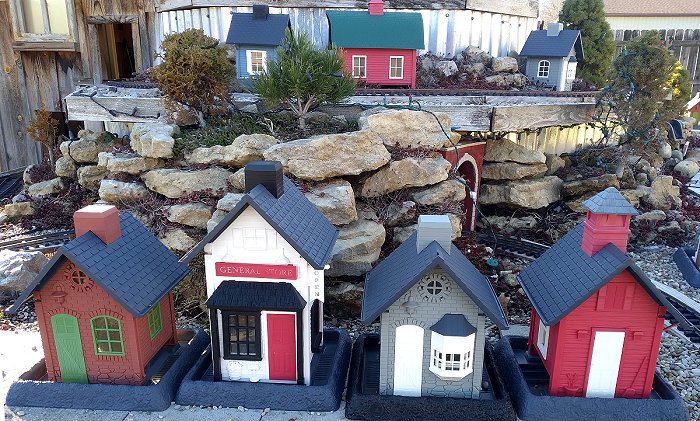 These North States feeders are 'holding down the fort' for my model buildings, which will reappear in late spring.  Click for bigger photo.